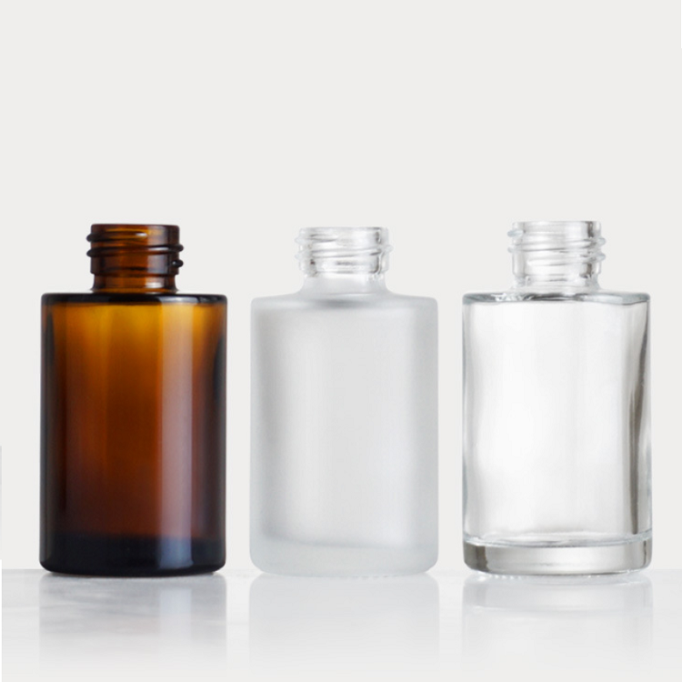 flat shoulder essential oil glass bottle