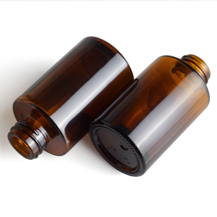 flat shoulder essential oil glass bottle