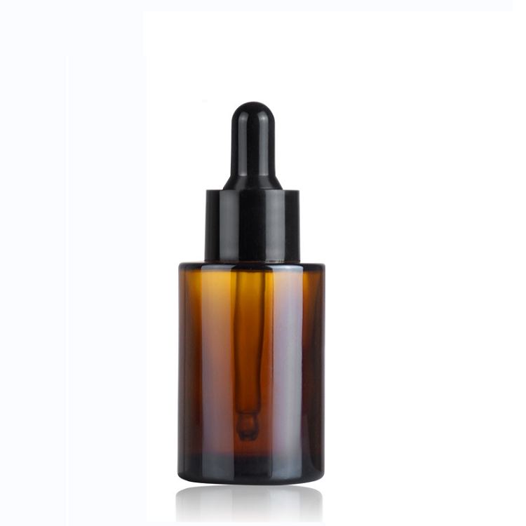 flat shoulder essential oil glass bottle