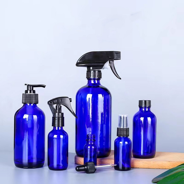 480ml 16oz Boston Blue Glass Bottle with Sprayer | Glint Featured Image